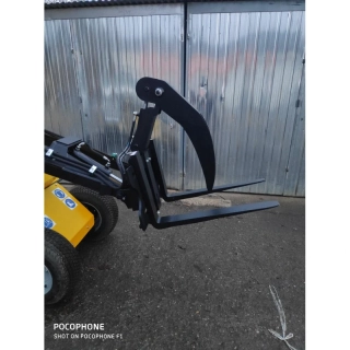 Paletové vidly s hydraulickým zubom na uchytenie materiálov